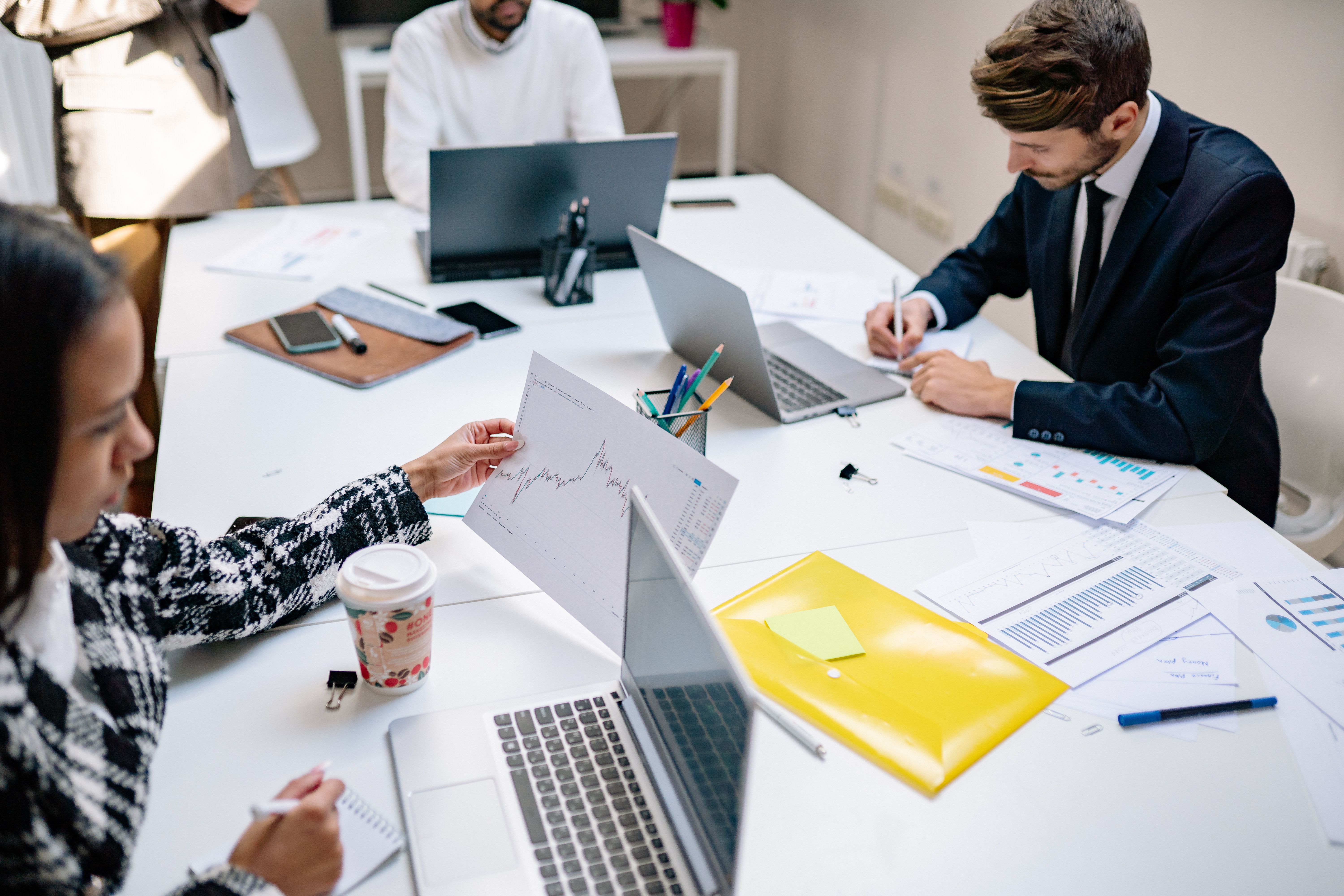 Marketing professionals reviewing business growth analytics